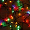 Xmas LED-es beltéri fényfüzér, 4m / 50db színes LED, állófényű, zöld vezeték, hálózati adapter